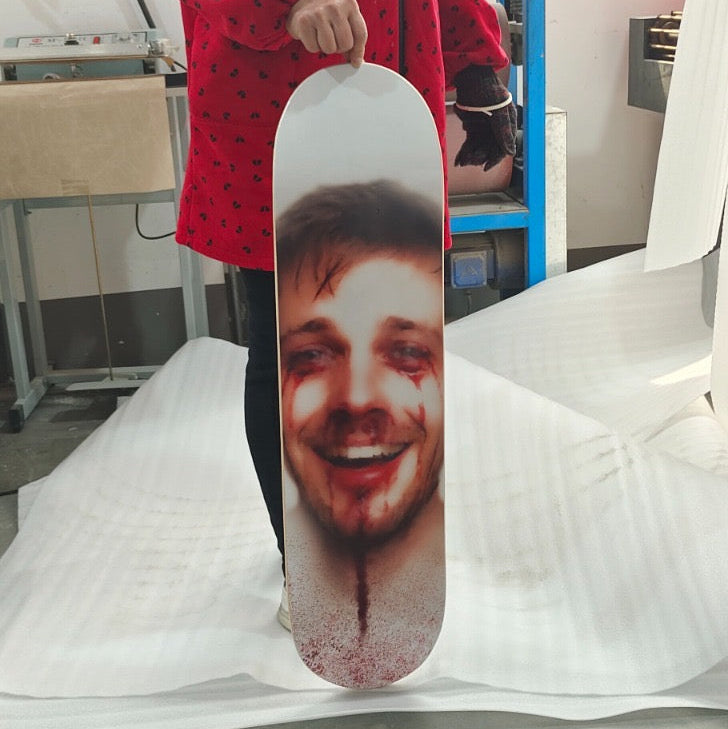 ‘Smile if you’re trying’ skateboard deck